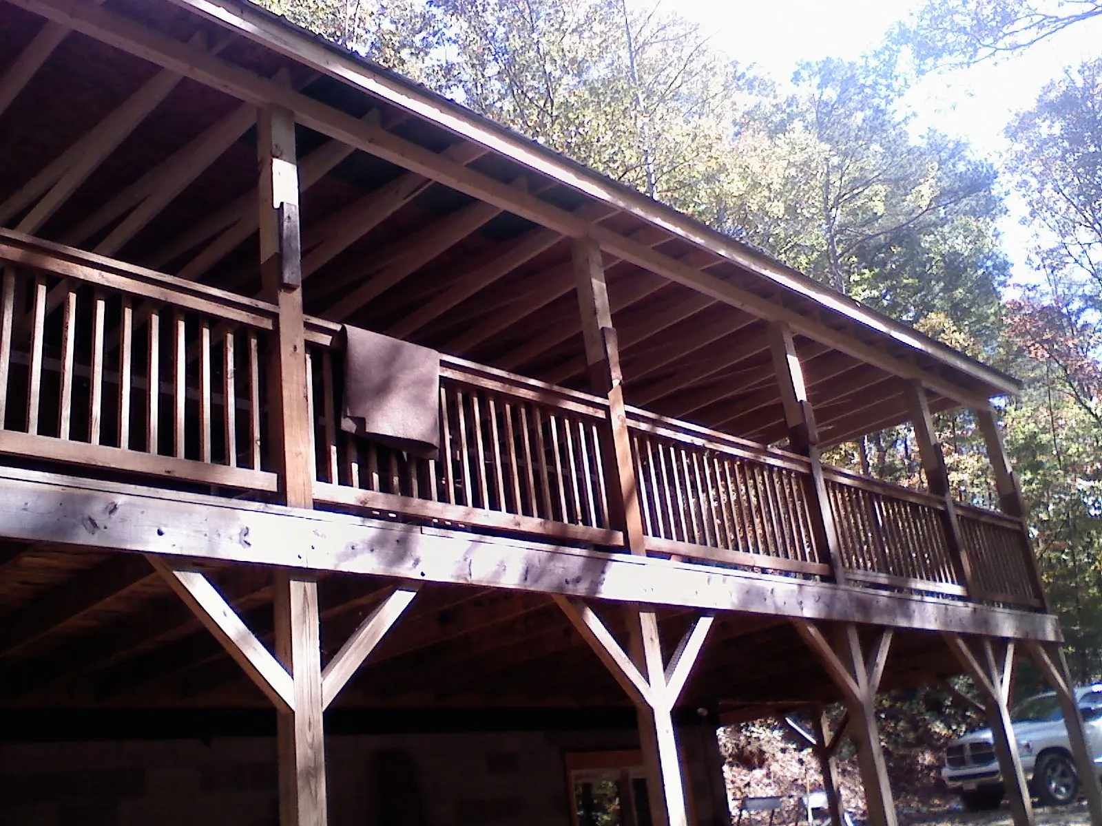 Timber framing under a new elevated porch and deck — Roof Leak Repair in New Hampton by Roofing Brothers